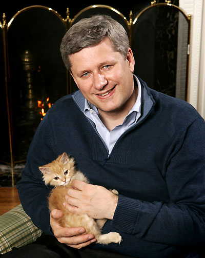 Stephen Harper checks his dinner for tenderness